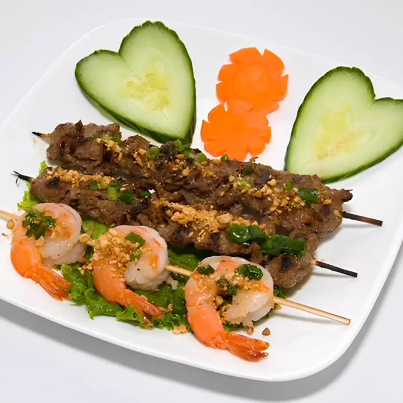 Grilled pork and spring rolls on rice vermicelli at Saigon Sun Vietnamese restaurant in Okotoks, AB